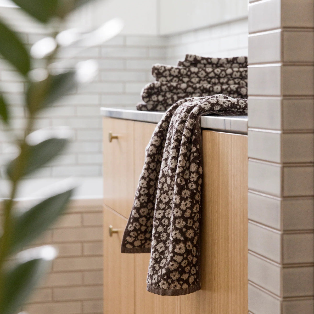 Chocolate oat hand towel in bathroom 