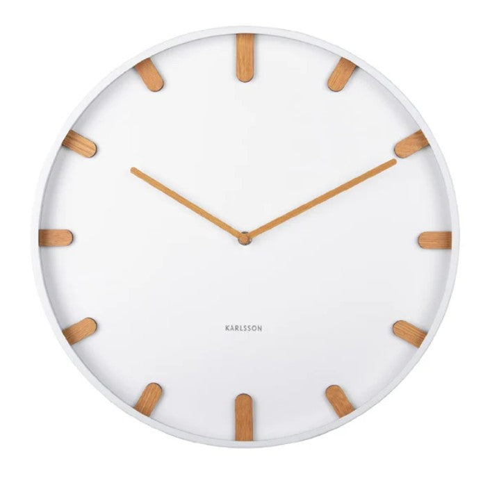 White wall clock with wooden hour markers