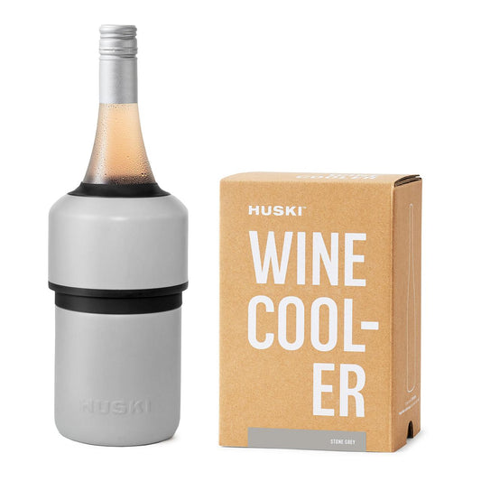 A grey Huski Wine Cooler next to its packaging box with the text 'WINE COOLER' visible on both the product and the box.