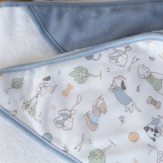 Baby blanket with dog pattern on a blue background