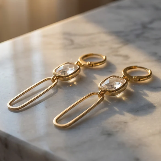 Gold earrings with clear stones