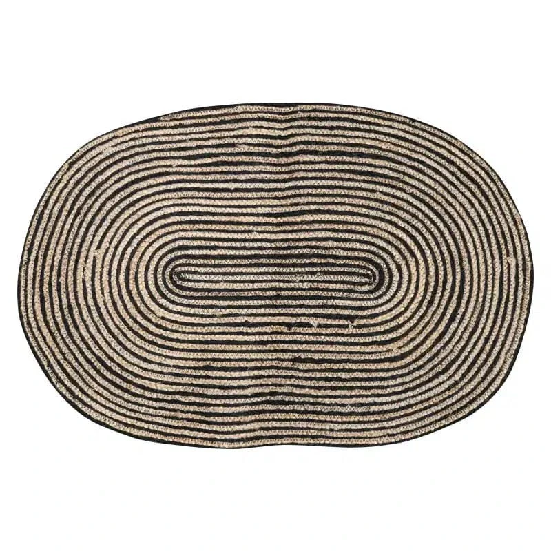 Oval-shaped braided door mat with a striped pattern