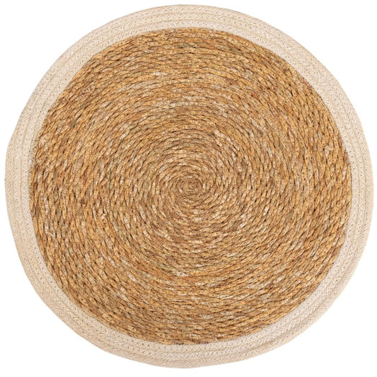 A round placemat made of jute with a seagrass border,
