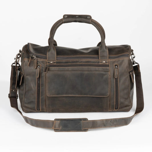 A large brown leather duffel bag with a smooth zipper, adjustable strap, and a padded compartment for laptops or similar sized devices.