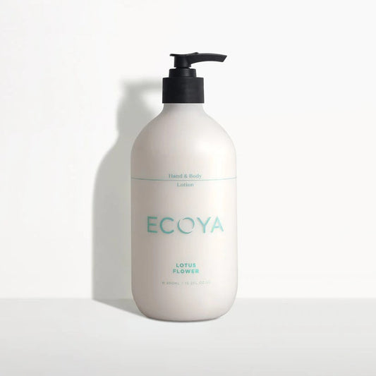 A white pump bottle with the brand name Ecoya printed on it, containing hand and body lotion.