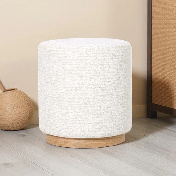 White textured cylindrical stool with wooden base 