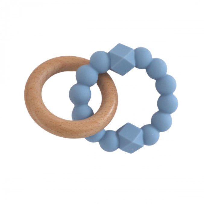 A blue and beige teether with a circular beech wood ring and a silicone teething ring designed for babies.

