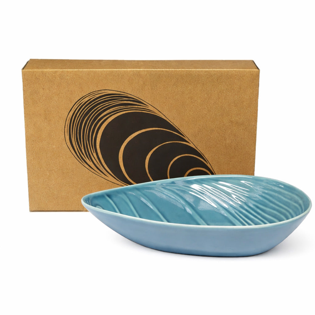 Blue ceramic bowl In the shape of a mussel