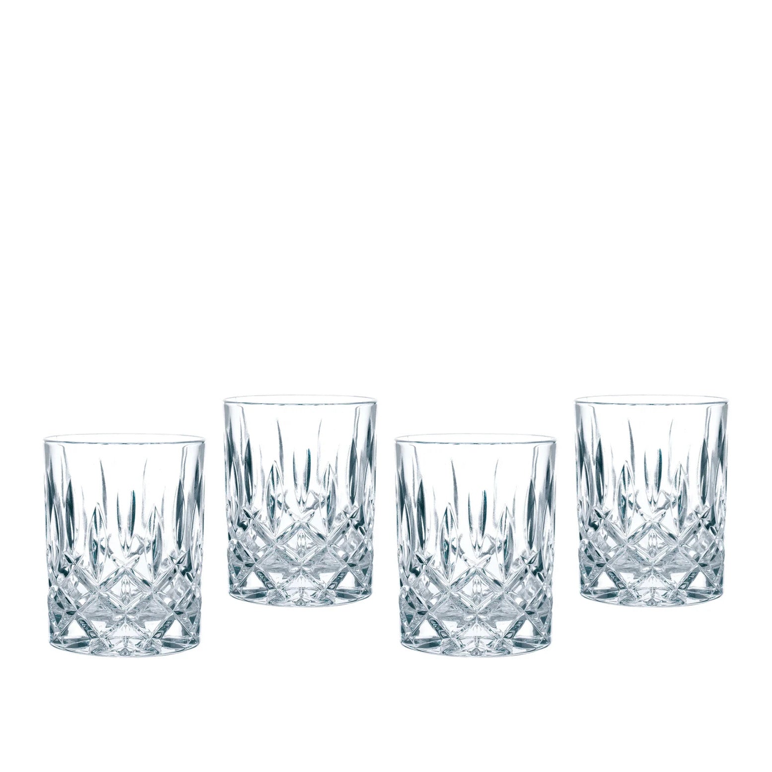 Four clear cut-crystal style whiskey glasses arranged in a row on a plain white background.