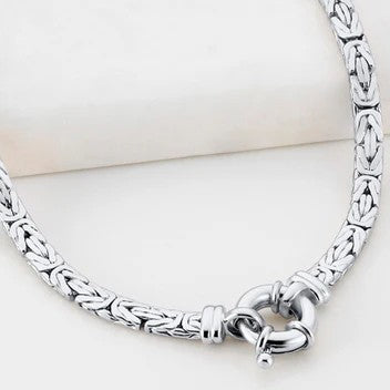 Silver bracelet with intricate design