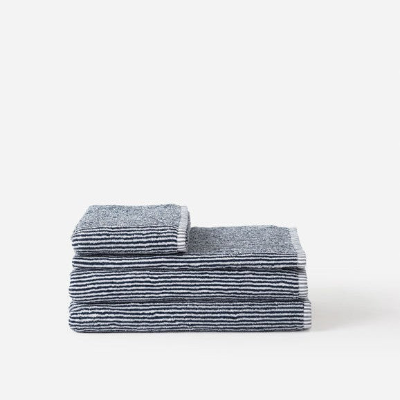 Navy and white Stripe bathroom towels in white background