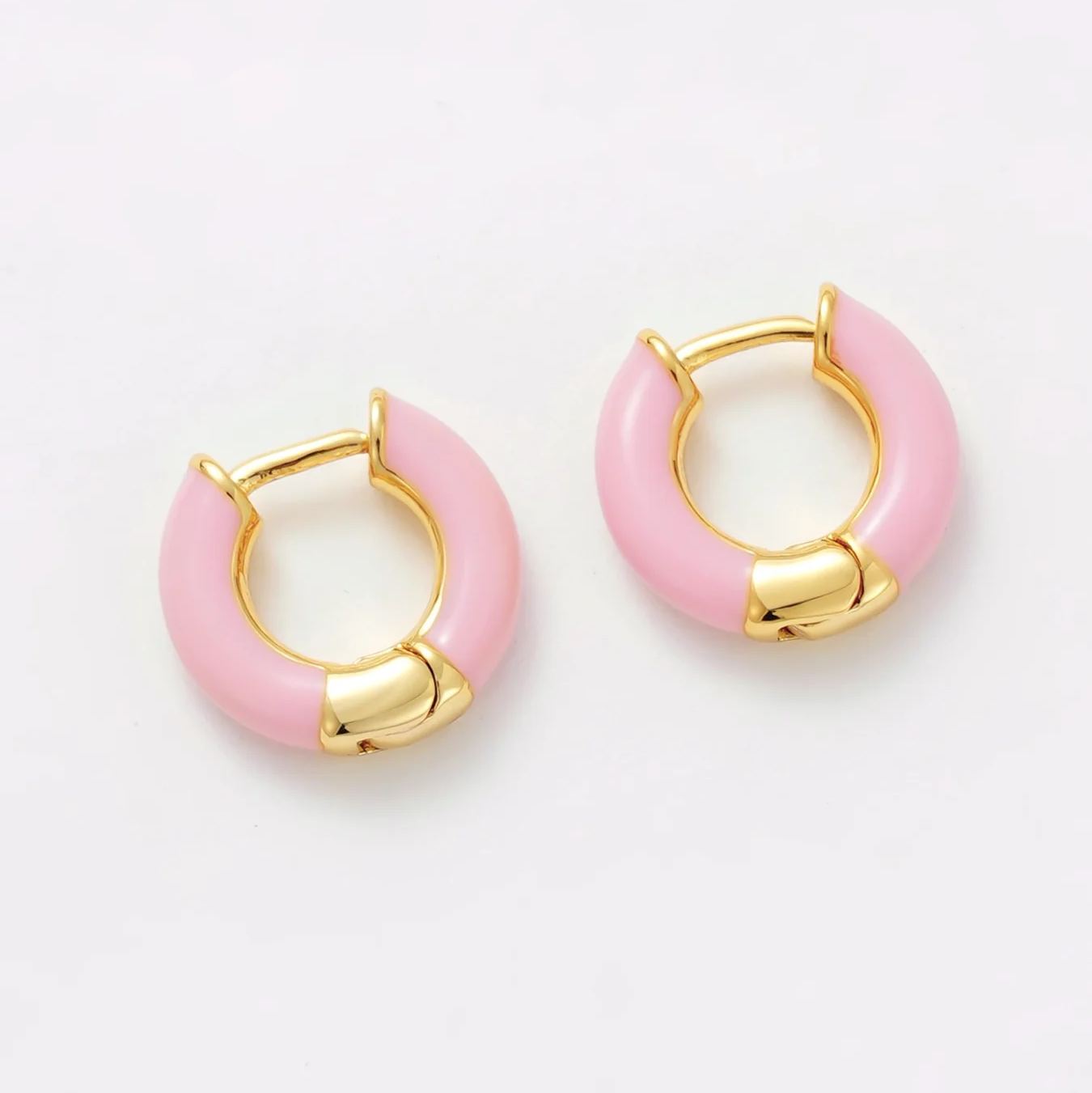 Pink hoop earrings with gold accents 