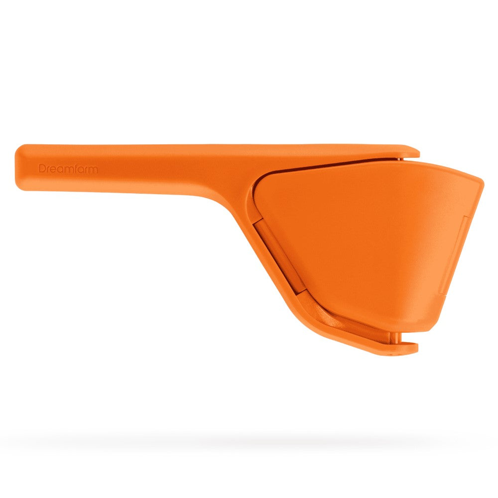 An orange Fluicer citrus juicer with a fold flat design, featuring a two-handed sideways pivot operation and a hinged mechanism.