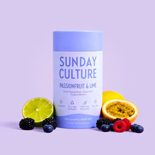 Sunday Culture product with passionfruit, lime, and berries on a purple background