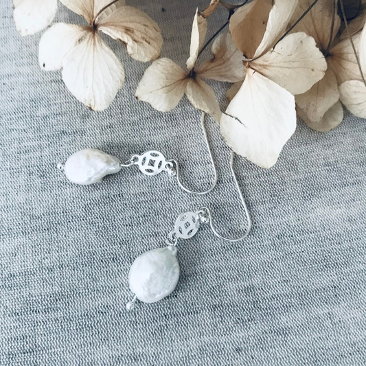 freshwater pearl earrings paired with a Sterling silver disc charm, 