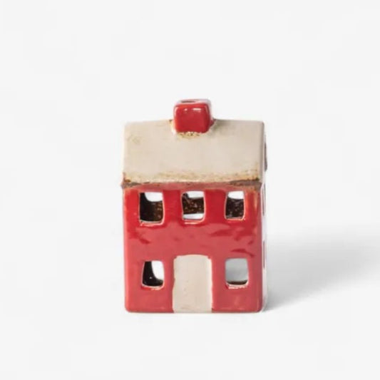 Small ceramic house with a red roof