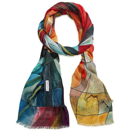 Colorful merino wool scarf with abstract patterns on a white background