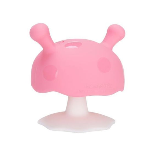 A pink silicone teether in a mushroom shape designed for babies.