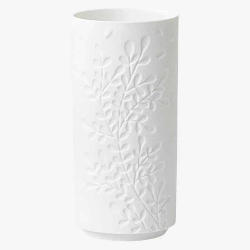 White vase with embossed branch pattern