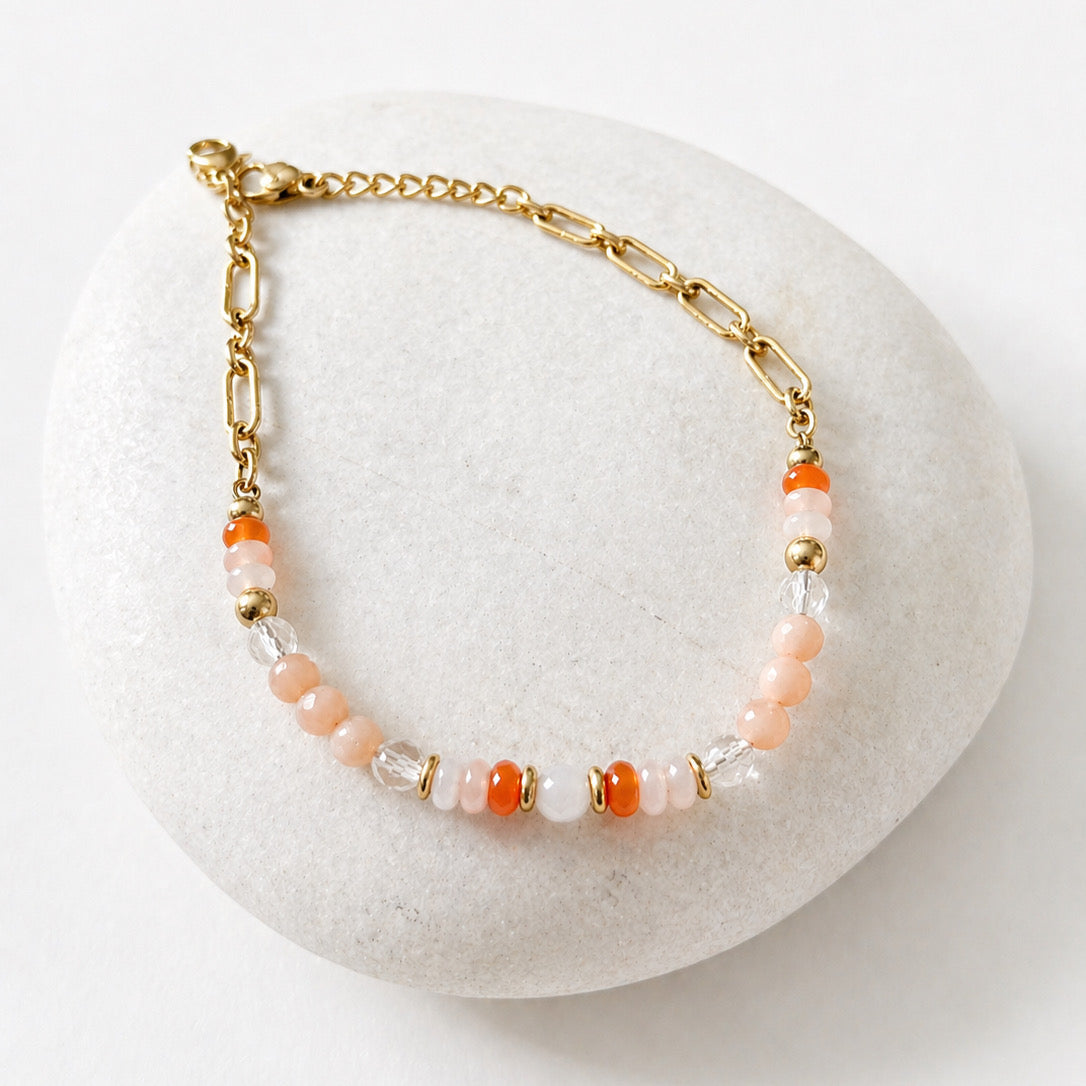 Bracelet with pink, orange, and clear beads 