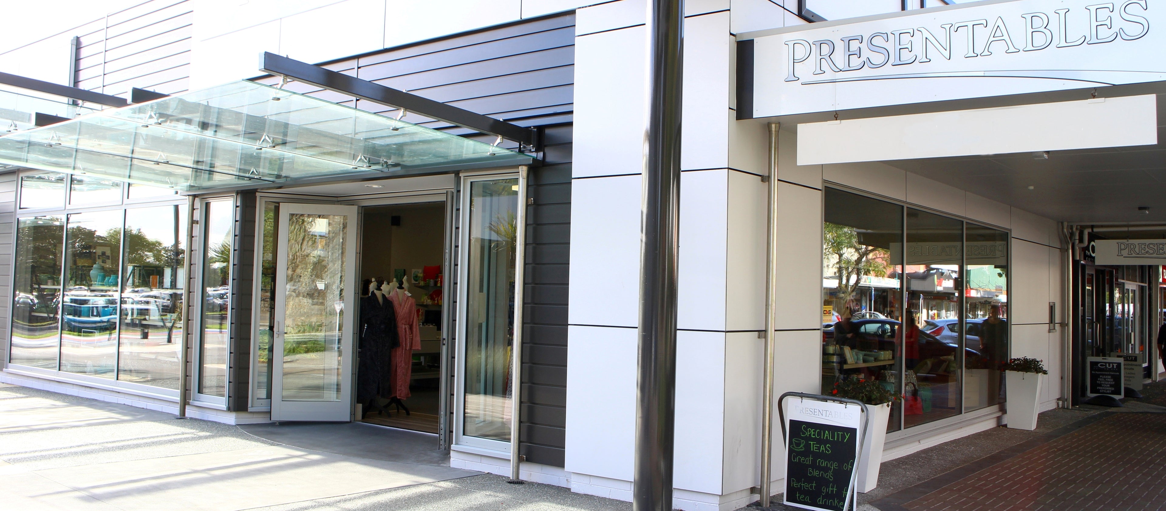 Storefront WHAKATANE with 'Presentables' sign and glass entrance