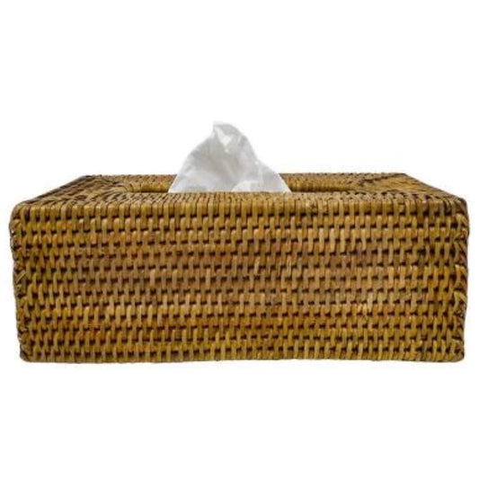 A rectangular rattan tissue box cover in a natural color with a woven design, containing facial tissues.