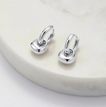 A pair of Zafino Sadie Hoop Earrings in silver color