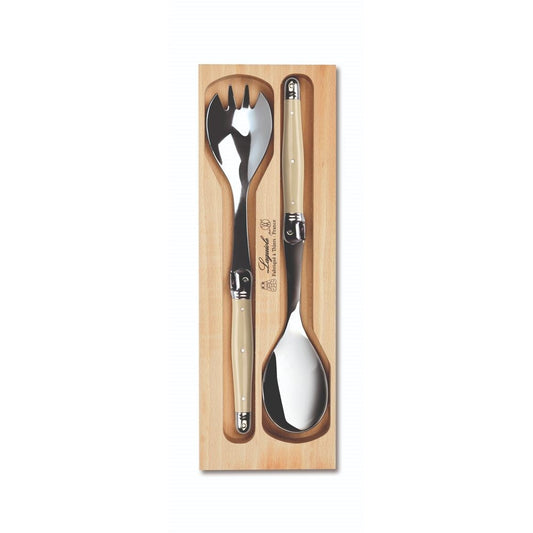 A set of ivory-colored stainless steel salad utensils with beige handles, presented in a wooden gift tray.