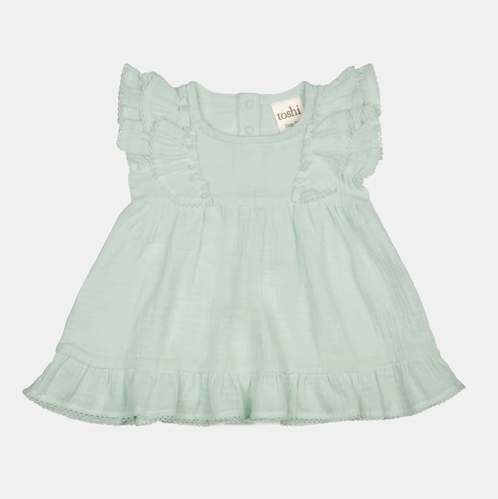 Mint green baby dress with ruffled sleeves