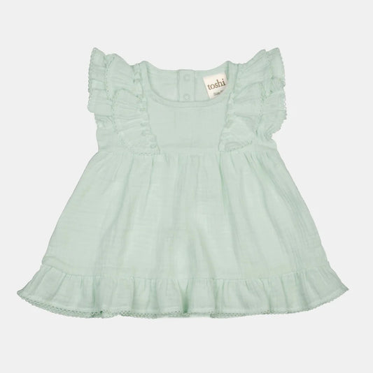 Mint green baby dress with ruffled sleeves