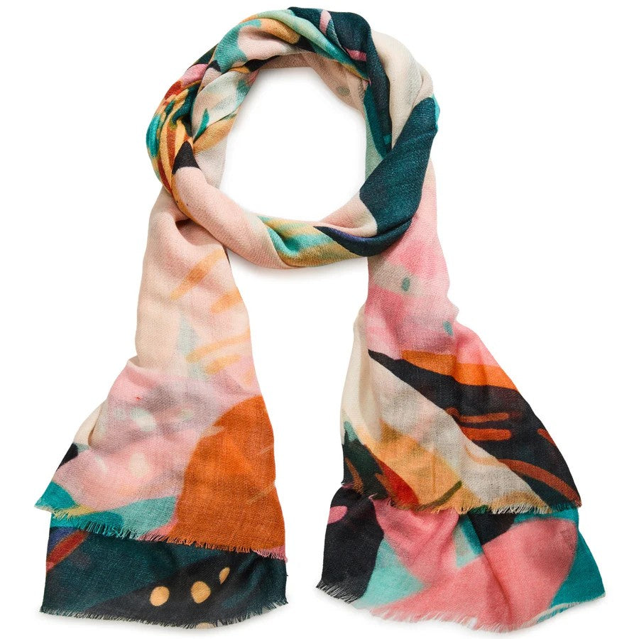 A satin wool scarf with multicolored abstract patterns and eyelash fringes, predominantly in pink, orange, and green tones.