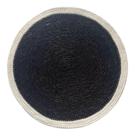 A round braided placemat with a dark navy blue center and a contrasting off-white rope border, shown from a top-down view on a white background.