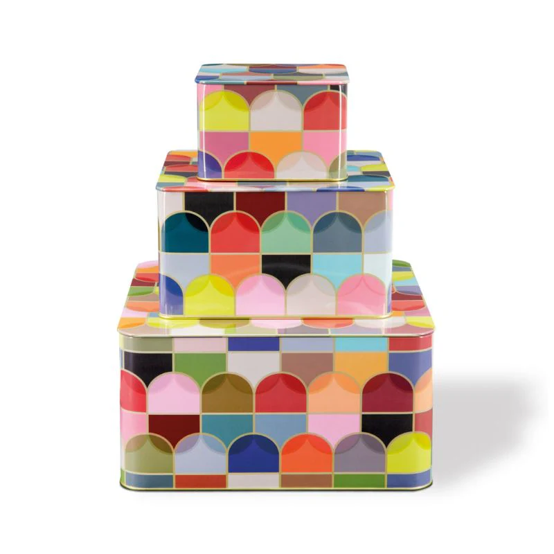 Stack of colorful geometric-patterned square boxes 