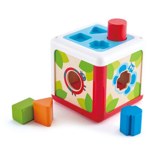 Colorful children's shape sorting cube with blocks