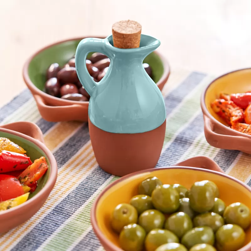 Terracotta oil bottle with a cork lid 