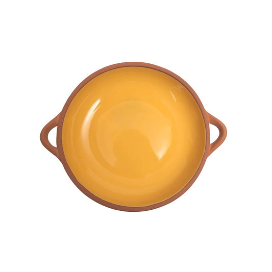 A round yellow terracotta bowl with a terracotta-colored rim and two loop handles,
