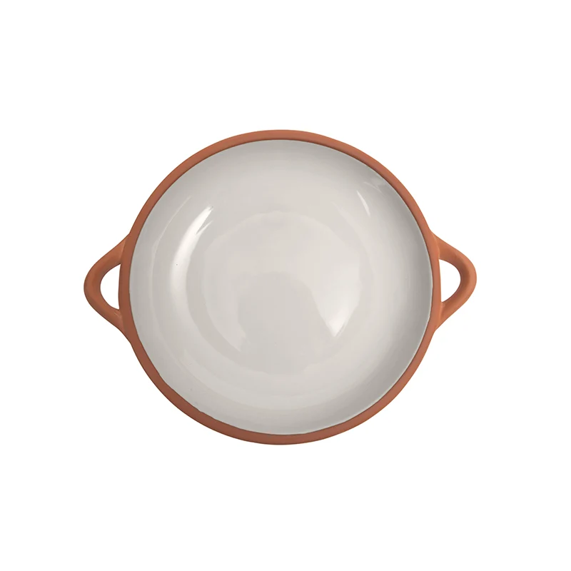 A large shallow terracotta dish glazed in stone coloring 