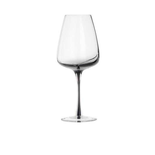 A clear smoke glass wine glass with elegant curves and a thin stem.