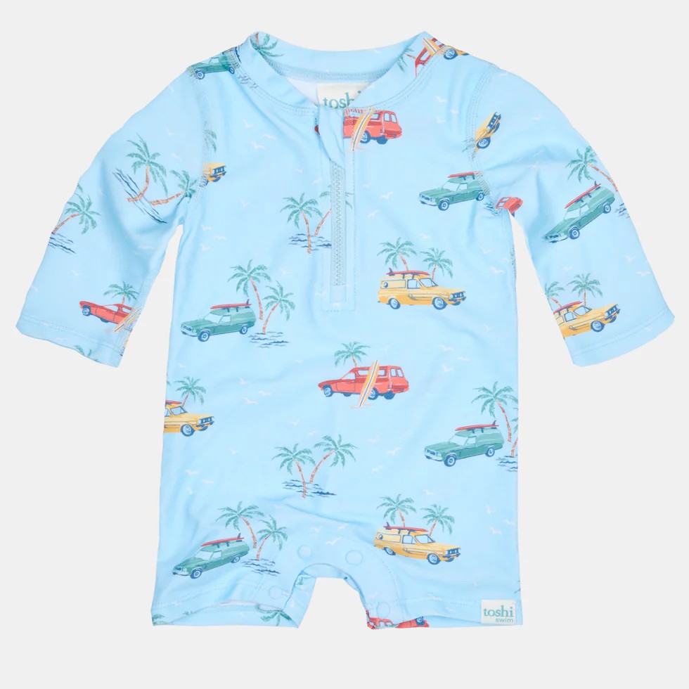 Children's blue swimsuit with car and palm tree pattern 