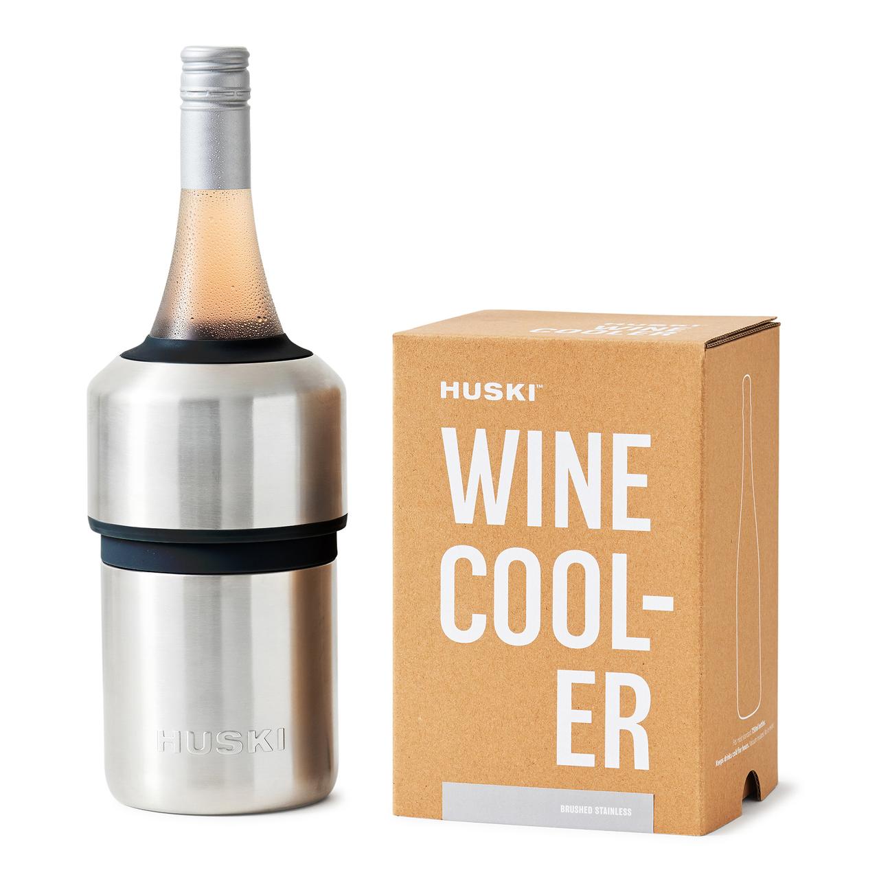 A stainless steel Huski wine cooler designed to keep wine chilled, displayed alongside its packaging box.