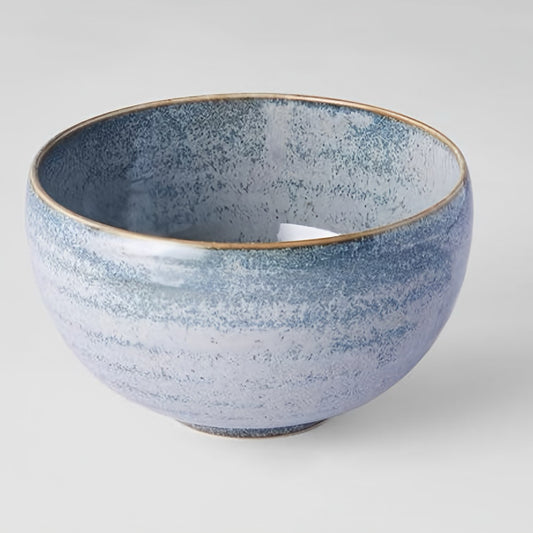 Blue ceramic bowl with speckled texture