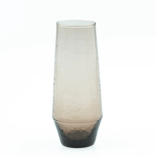 A bronze stemless champagne flute with a hammered texture, part of a set of four.