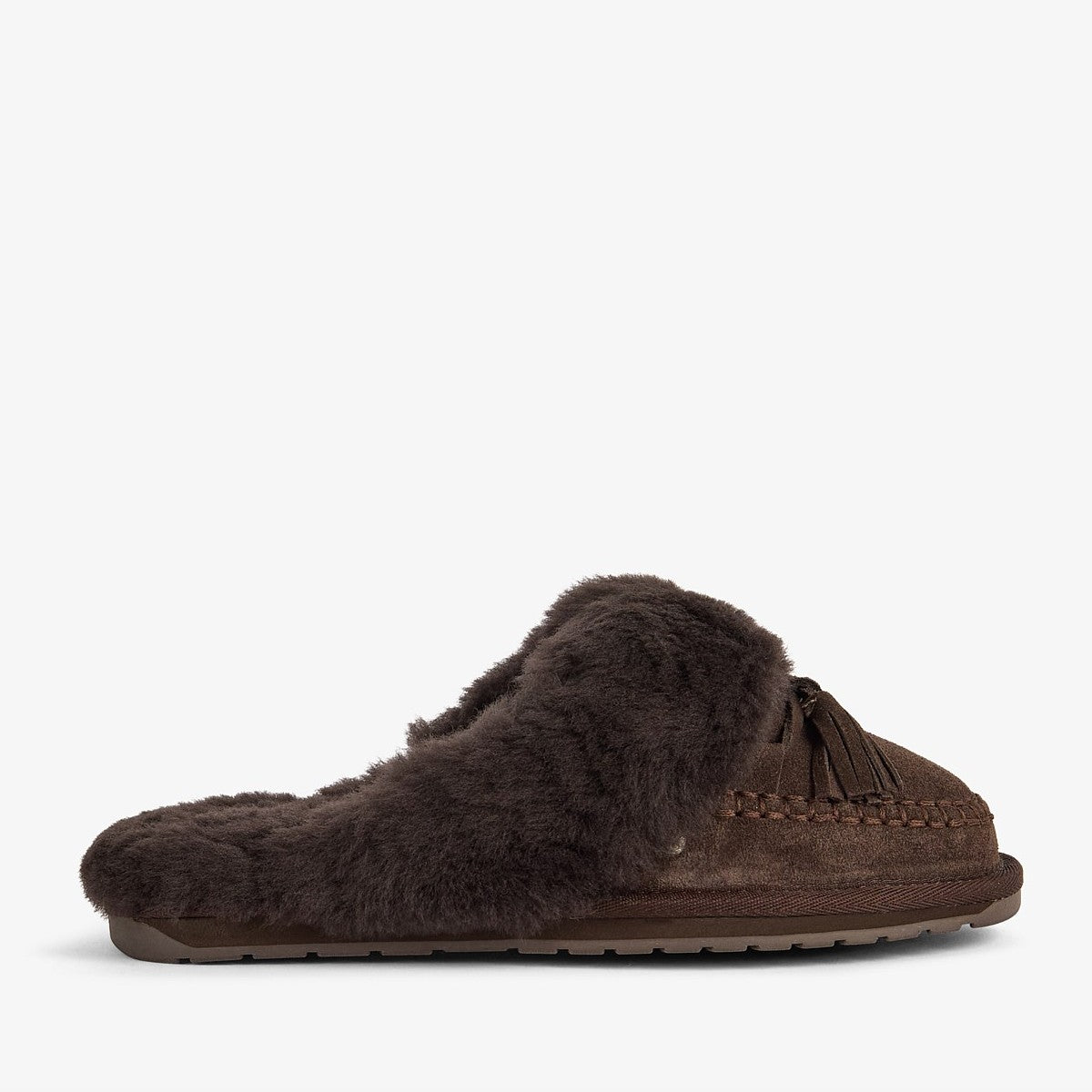 Side view of a Sheepskin Slipper in Chocolate colour with brown stitching and tassels on the front on a white background