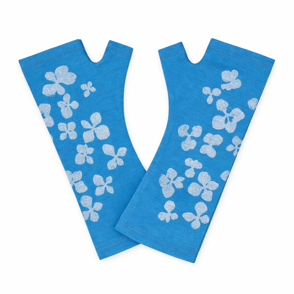 Pair of blue fingerless gloves with white floral patterns 