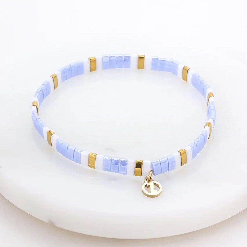 Blue and Gold Tile Bracelet on white background