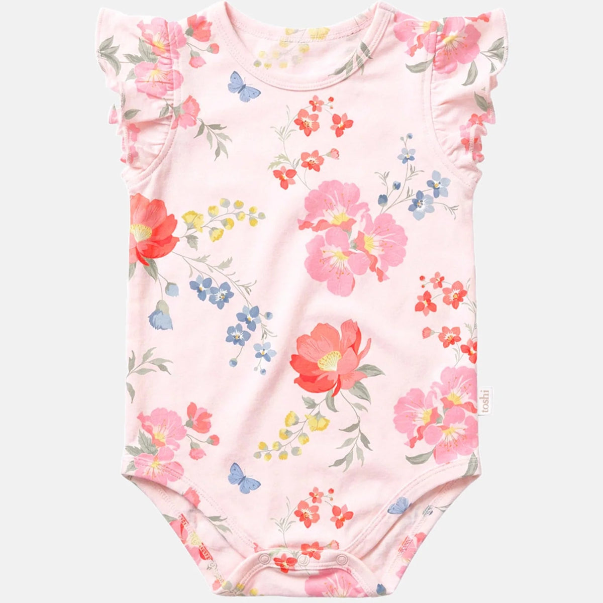 A baby bodysuit in light pink with a watercolor floral print featuring red, pink, blue, and yellow flowers, green leaves, and small blue butterflies. It has ruffled cap sleeves and a snap closure at the bottom.
