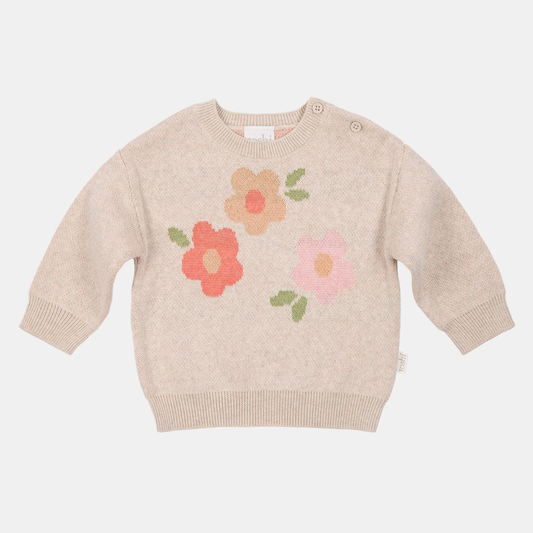 Beige sweater with floral patterns