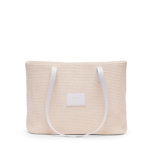 Beige woven tote bag with white handles