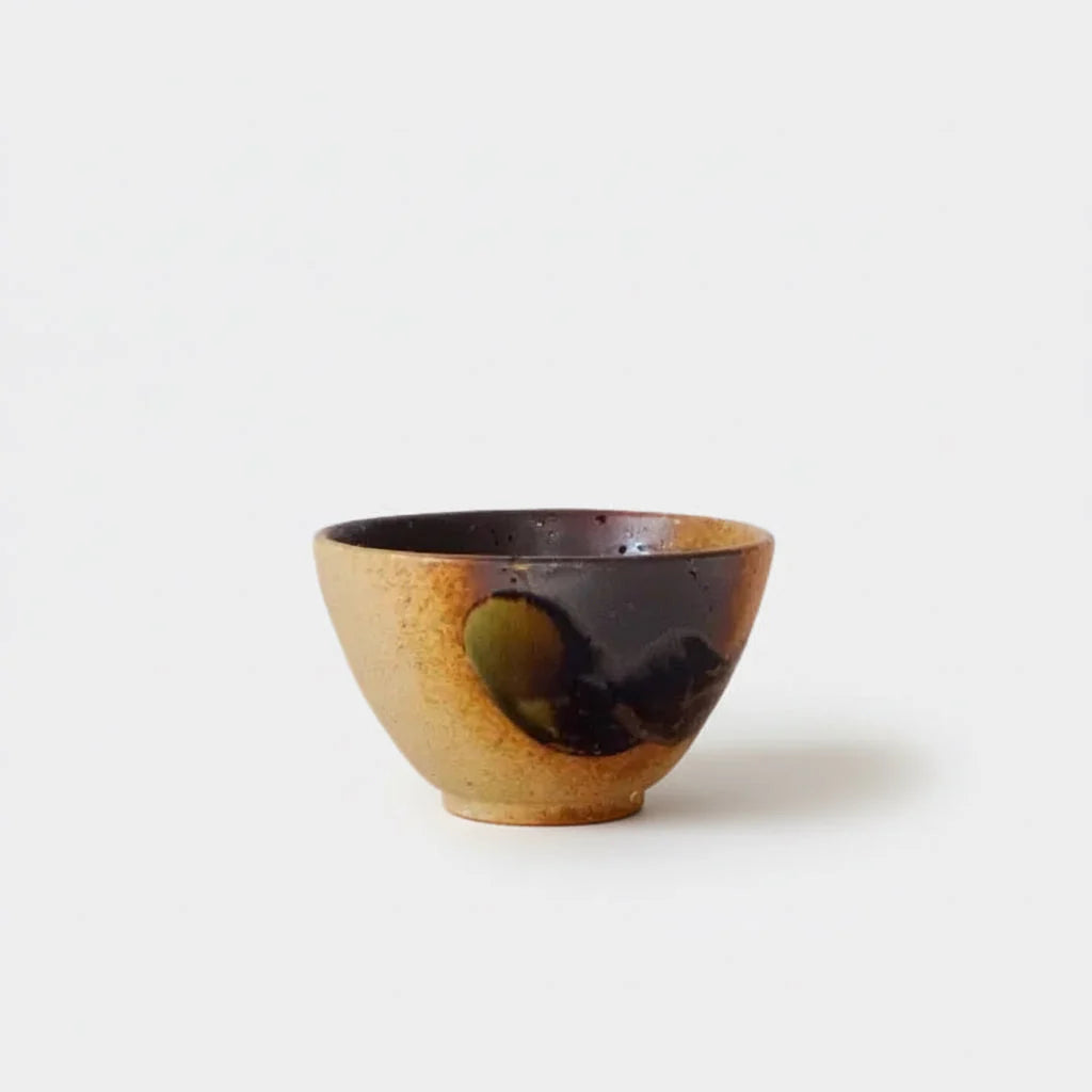 Ceramic bowl with brown and black glaze