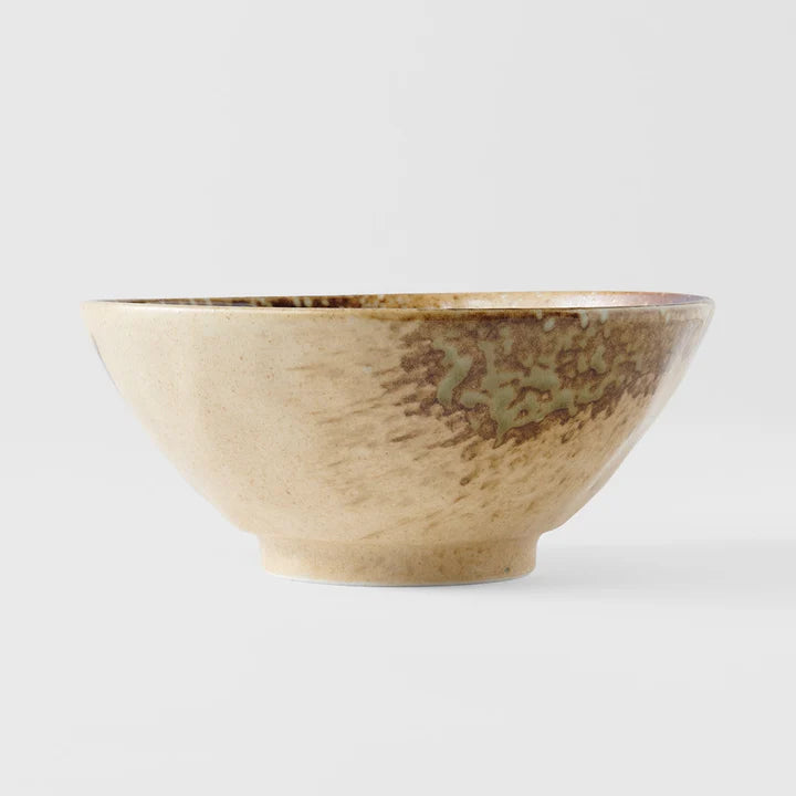 Beige ceramic bowl with brown speckles